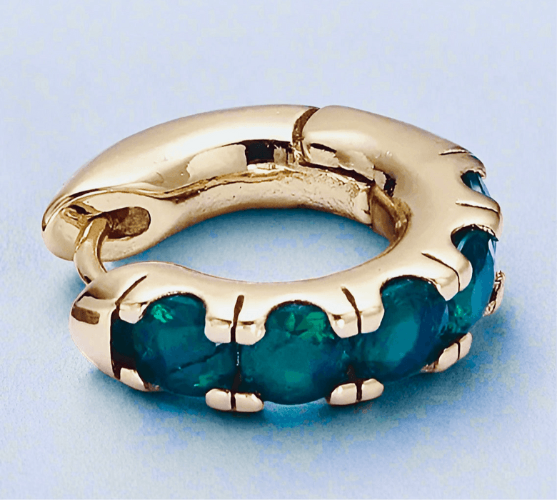 Emerald Stone Huggie HoopsFinding the perfect pair of earrings that combine elegance with everyday comfort can be a challenge. Many earrings either feel too heavy or lack the subtle sparkle tEmerald Stone Huggie HoopsPearl & PrismPearl & Prism