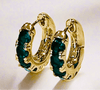 Emerald Stone Huggie HoopsFinding the perfect pair of earrings that combine elegance with everyday comfort can be a challenge. Many earrings either feel too heavy or lack the subtle sparkle tEmerald Stone Huggie HoopsPearl & PrismPearl & Prism