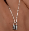 Sterling Silver Lock NecklaceOur Sterling Silver Lock Necklace is crafted with sustainability at its heart, designed for those who value style without compromising the planet. By choosing this eSterling Silver Lock NecklacePearl & PrismPearl & Prism