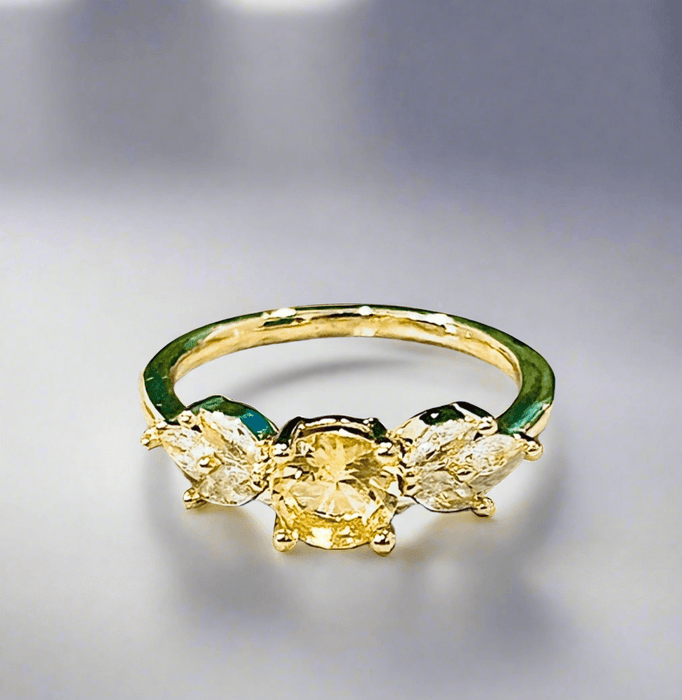 Yellow Topaz Ring with radiant yellow zirconia and eco-friendly gold plating.