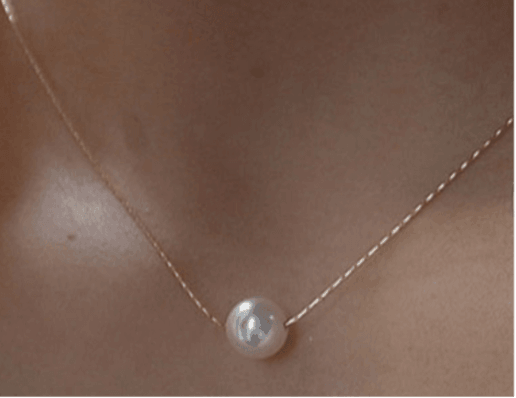 Single Pearl NecklaceOur Single Pearl Necklace embodies sustainable luxury, designed for those who value elegance without compromising the environment. Crafted with mindfulness, this pieSingle Pearl NecklacePearl & PrismPearl & Prism