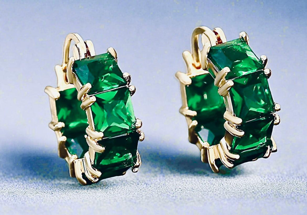 Emerald Green Square HoopsOur Emerald Green Square Hoops are crafted with a keen commitment to sustainability, ensuring that your style choices reflect care for the planet. These elegant emerEmerald Green Square HoopsPearl & PrismPearl & Prism