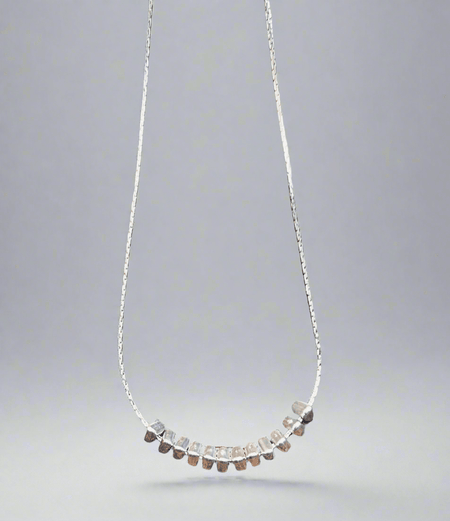Silver Ring Necklace crafted from recycled sterling silver, showcasing sustainable elegance and ethical craftsmanship.