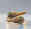 Gold multicolor snake wrap around adjustable ring with gemstones.