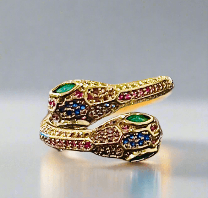 Gold multicolor snake wrap around adjustable ring with gemstones.