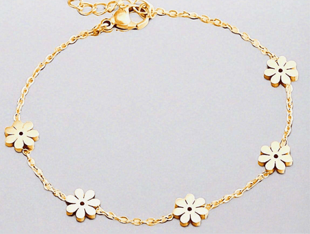 Golden Daisy Bracelet with floral motifs on a delicate gold chain, crafted from recycled gold for sustainable elegance.