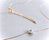 Elegant Single Pearl Necklace with gold chain highlights sustainable luxury.