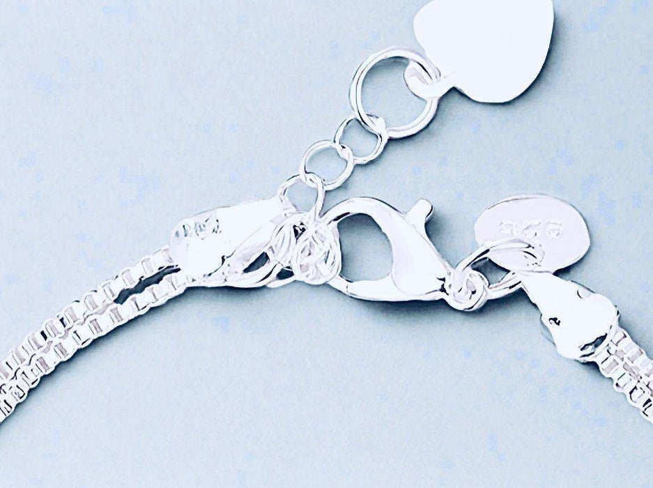 Sterling Silver Charm Bracelet