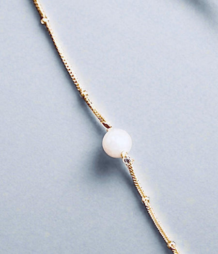 Single Pearl Minimalist BraceletOur Single Pearl Minimalist Bracelet embodies a commitment to sustainable fashion, designed thoughtfully to reduce environmental impact without compromising on styleSingle Pearl Minimalist BraceletPearl & PrismPearl & Prism