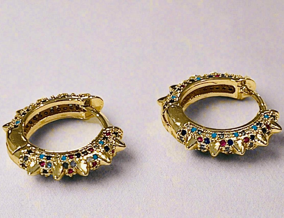 Rainbow Spike Huggie HoopsFinding the perfect pair of earrings that combine bold style with everyday comfort can be a real challenge. Many jewelry pieces either sacrifice comfort for design oRainbow Spike Huggie HoopsPearl & PrismPearl & Prism