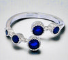 Silver Sapphire Gemstone Adjustable Ring in 925 silver with vibrant blue stones.