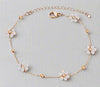 Eco-friendly Flower Charm Bracelet made of durable stainless steel with elegant flower design.