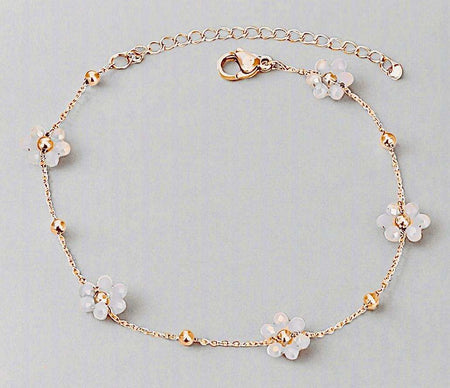 Eco-friendly Flower Charm Bracelet made of durable stainless steel with elegant flower design.