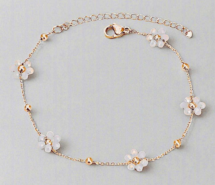 Eco-friendly Flower Charm Bracelet made of durable stainless steel with elegant flower design.